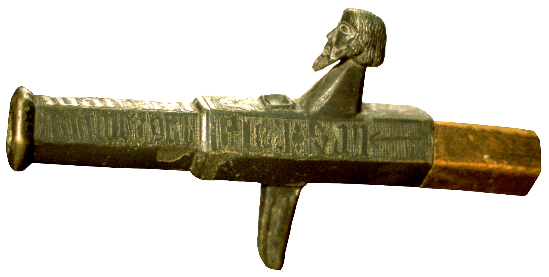 Figure 3 — The Swedish Mörkö hand cannon, cast around 1390 in bronze with a bearded human face at the muzzle and a socket for a wooden pole. Source: Wikimedia Commons.