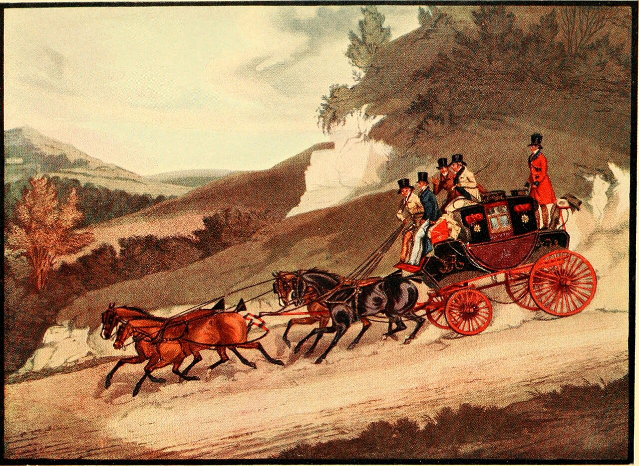 Figure 2 — A mail coach of the coaching era, the armed guard in his scarlet coat riding at the rear. From about 1788 to 1816 the British Royal Mail issued its guards flintlock blunderbusses — brass-barrelled …