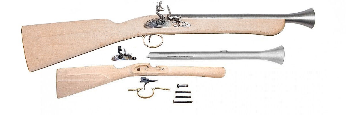 Figure 2 — The KR510 flintlock kit as it ships: the assembled gun at top for reference, and below it the parts you actually receive — the flared white-steel barrel, the flintlock on its plate, the two-piece h…