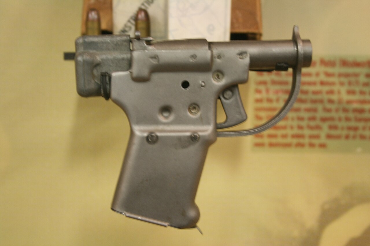 Figure 3 — A stamped Liberator captioned as air-dropped to partisans. Images like this fueled the "dropped all over Europe" story; the documentary record shows the mass European air-drop was in fact rejected,…