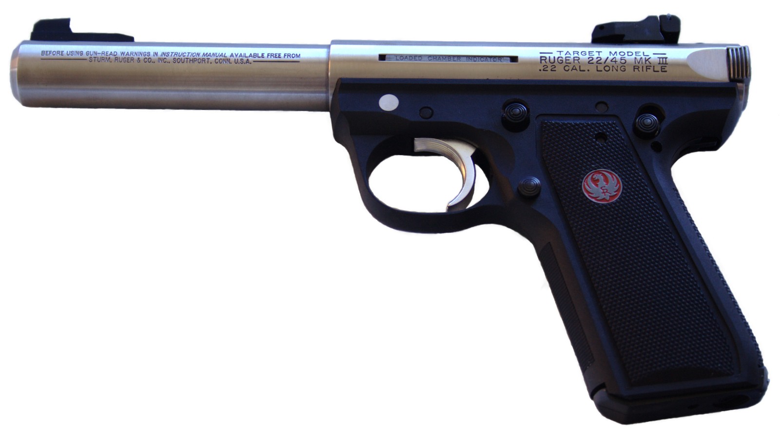 Figure 8 — A 22/45 Mark III Target — the polymer-frame branch, although the file on Commons is titled simply "Ruger MK III." The receiver is engraved LOADED CHAMBER INDICATOR above the indicator itself, makin…