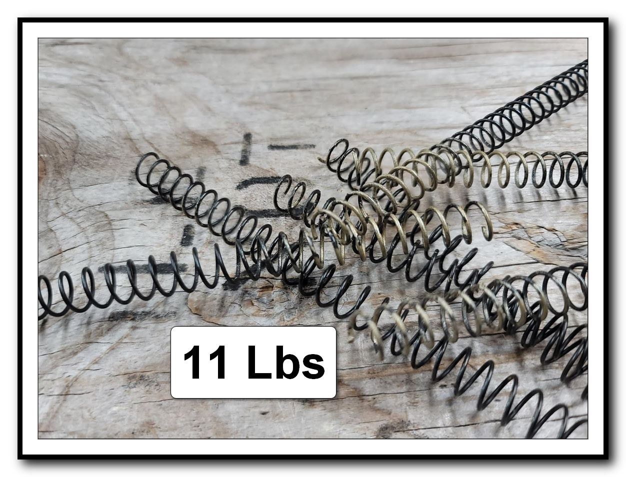Figure 3 — ArmoryCraft's 11 lb recoil spring, sold on its own for compensator and suppressor tuning. It is the lightest weight ArmoryCraft offers for the full-size P320 and the one fitted to the pistol docume…