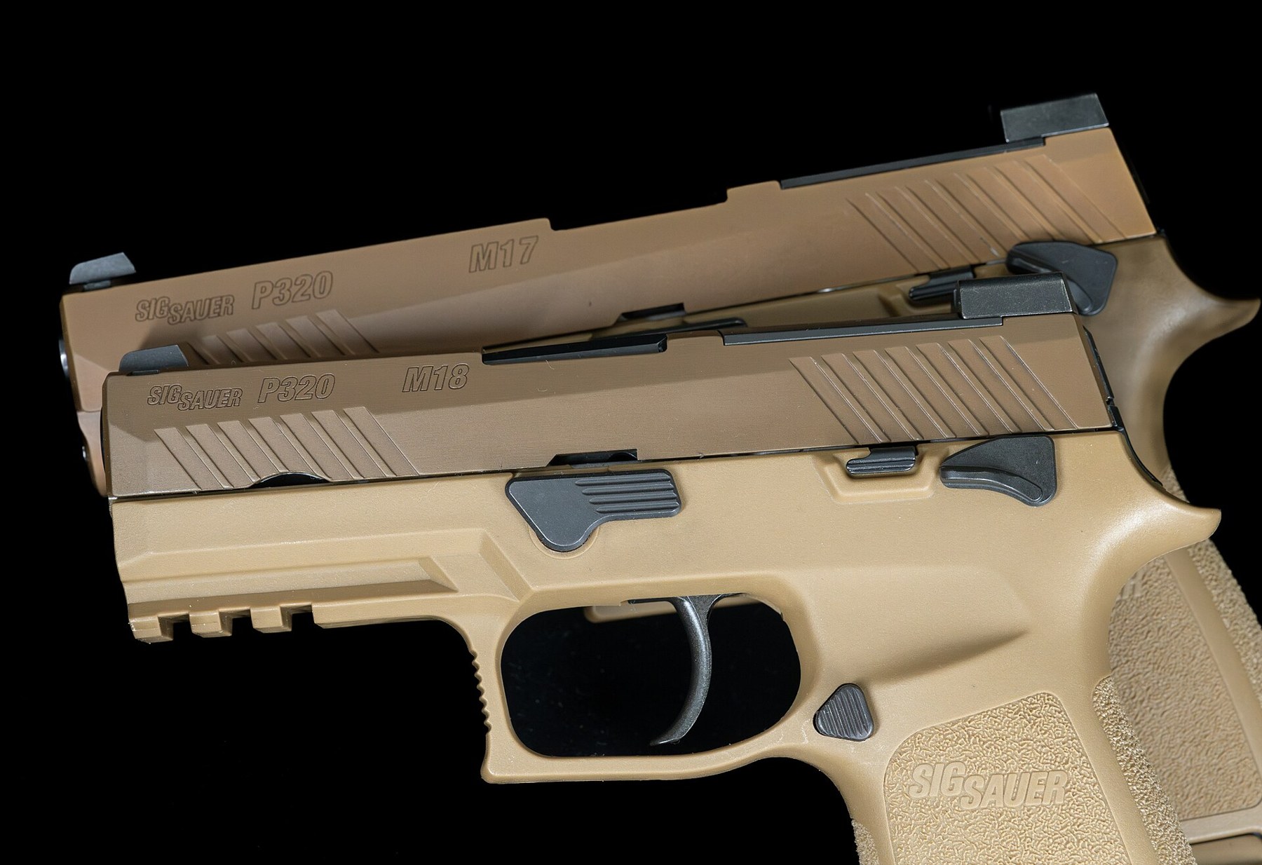 Figure 4 — The M17 (above) and M18 (below) side by side. The M18 has the same grip length on a shorter slide and barrel.