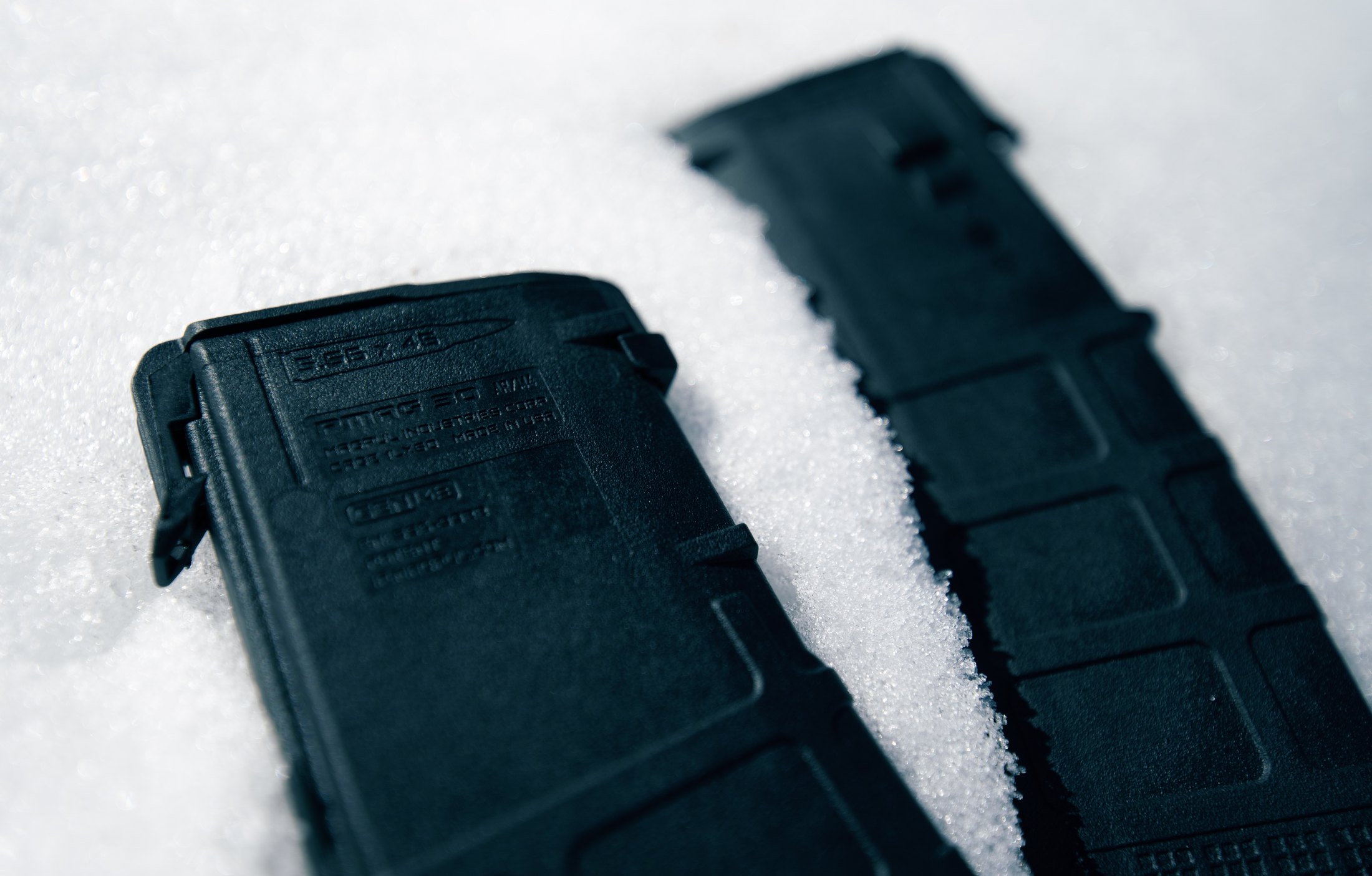 Figure 3 — Polymer AR-15 magazines. The feed lips at the top are the part that fails, and they are what an inspection should look at first.