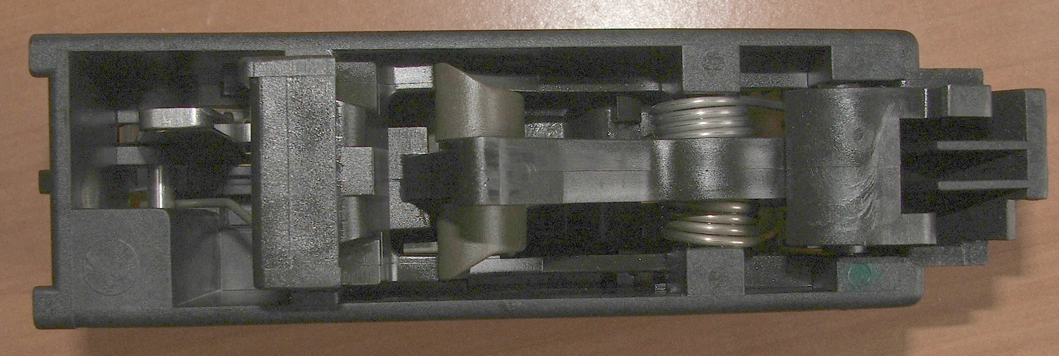 Figure 6 — The fire-control group, which on this weapon is a self-contained unit that comes out as a group. Access for inspection is genuinely good once the shell is open.