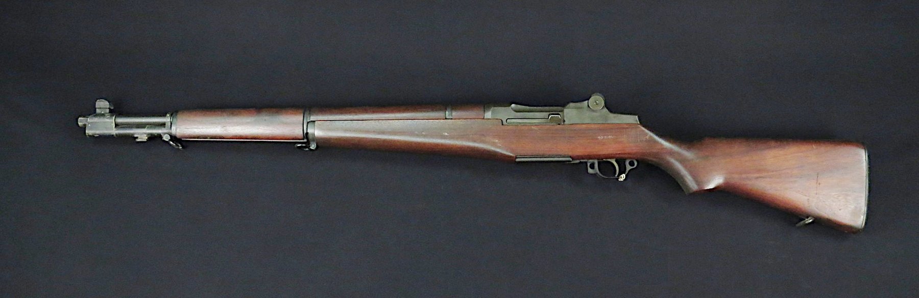 Figure 1 — A Springfield M1 from the Smithsonian's collection, left side. On an M1 almost every major part carries a maker's code and a drawing number, and those markings are how a rifle is dated and how its …