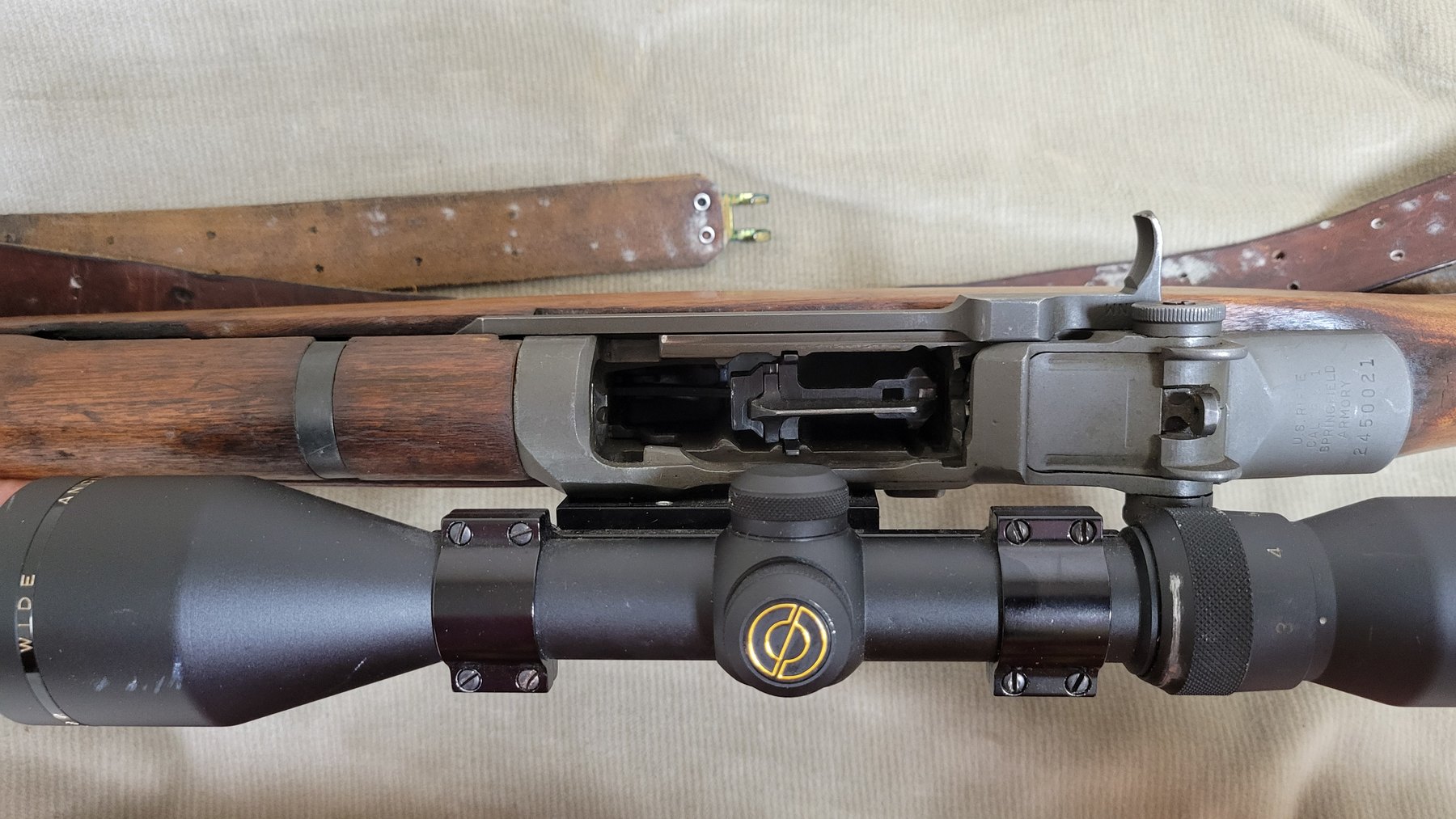 Figure 16 — The scope and mount from above. The mount is offset to the left of the receiver, which keeps the top open for clip loading and ejection.
