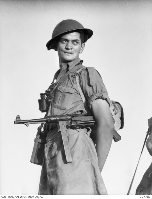 Figure 13 — A captured German submachine gun in Allied hands during the war. Captured MP 38s and MP 40s were used by whoever picked them up, on both sides, throughout the conflict.