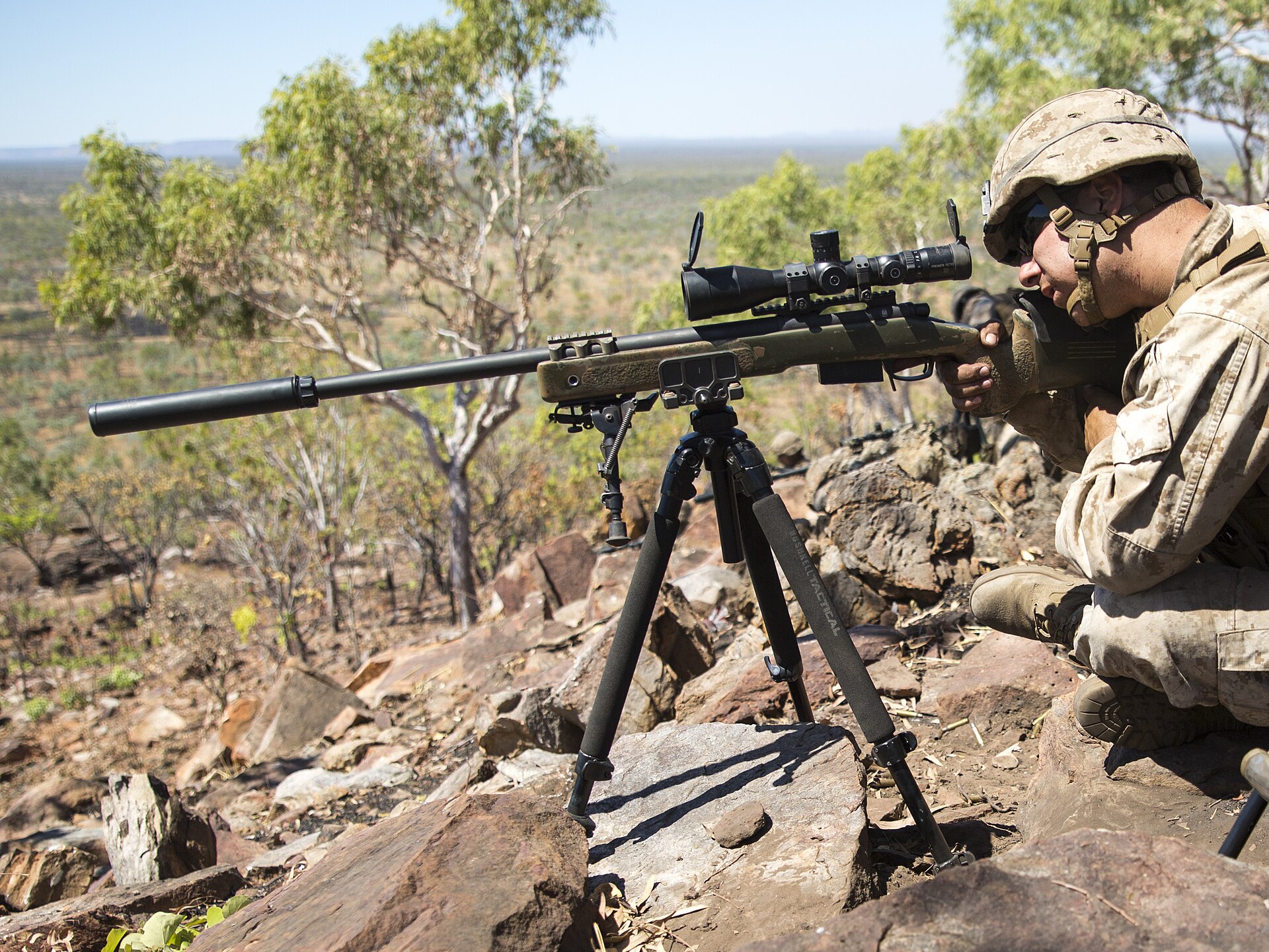 Figure 7 — A Marine of 1st Battalion, 5th Marines, with an M40A5 and suppressor during an unknown-distance qualification in Australia's Northern Territory, 18 August 2014.