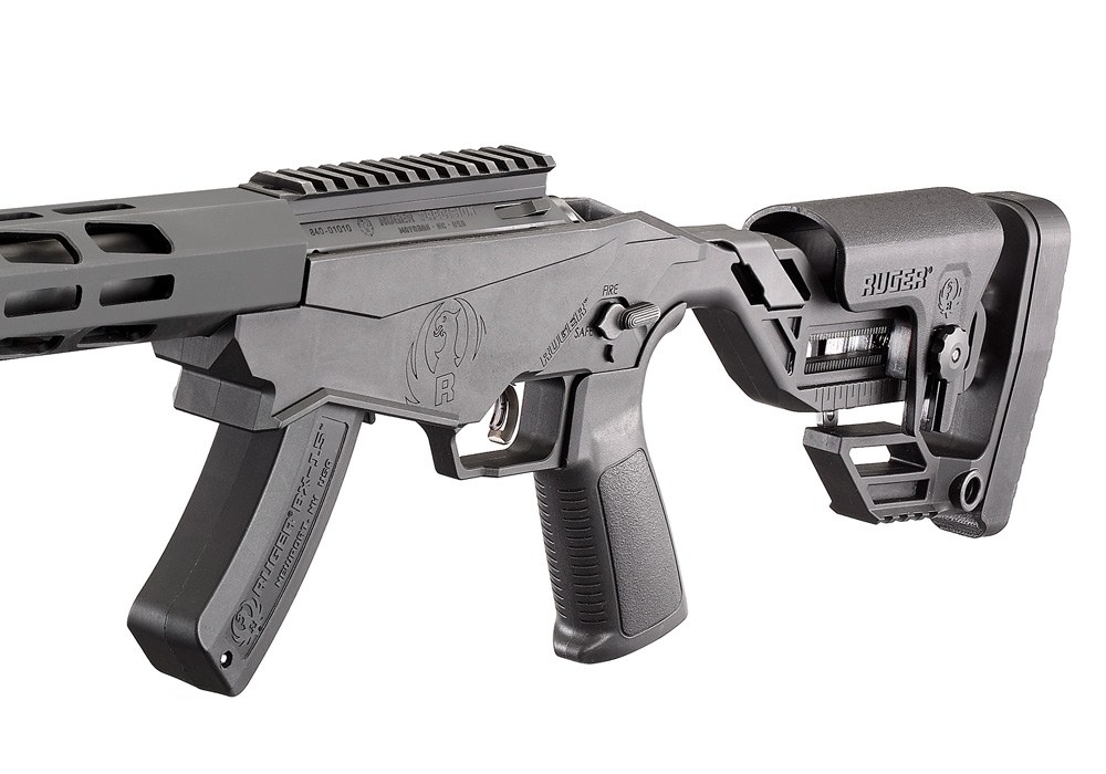 Figure 4 — The Precision Rimfire's one-piece moulded chassis and adjustable stock, with a BX-15 magazine in place and the magazine release lever behind it.