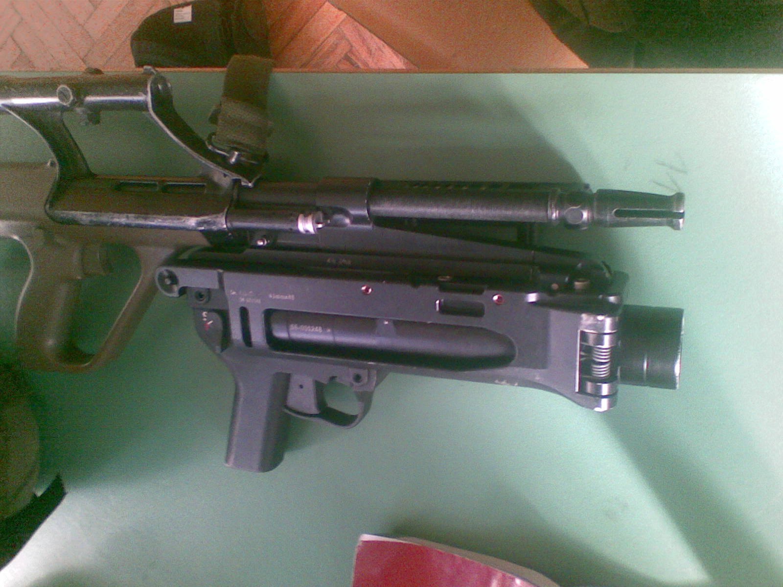 Figure 3 — An AUG A1 fitted with the AG-C rifle-grenade launcher, described by the uploader as a derivative of Heckler & Koch's AG36. Photograph: MoserB, public domain.