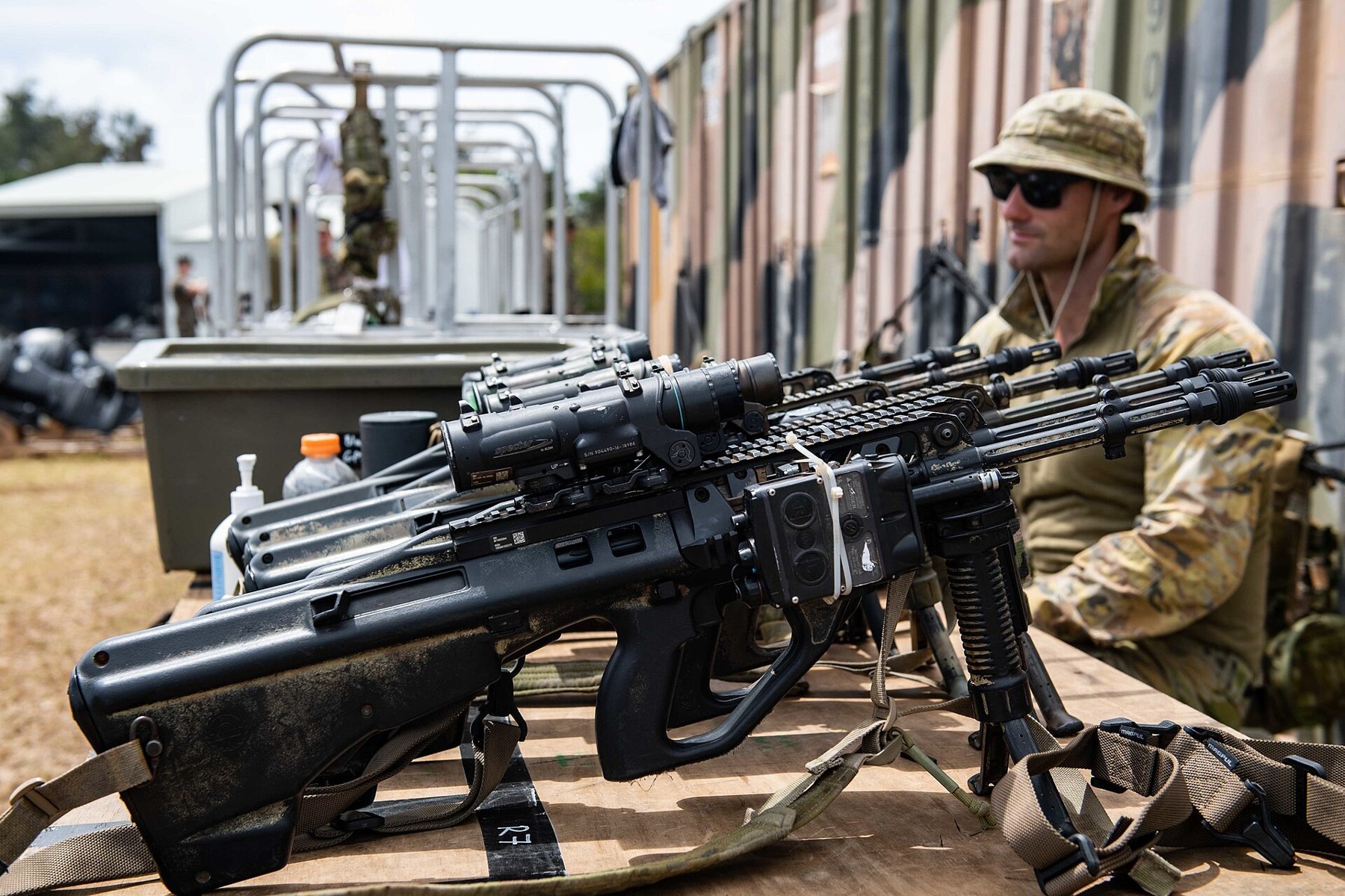 Figure 12 — EF88s racked during RIMPAC 2022 at Kaneohe Bay, Hawaii, with an Australian soldier of 2 RAR (Amphibious). Photograph: US Navy, public domain.