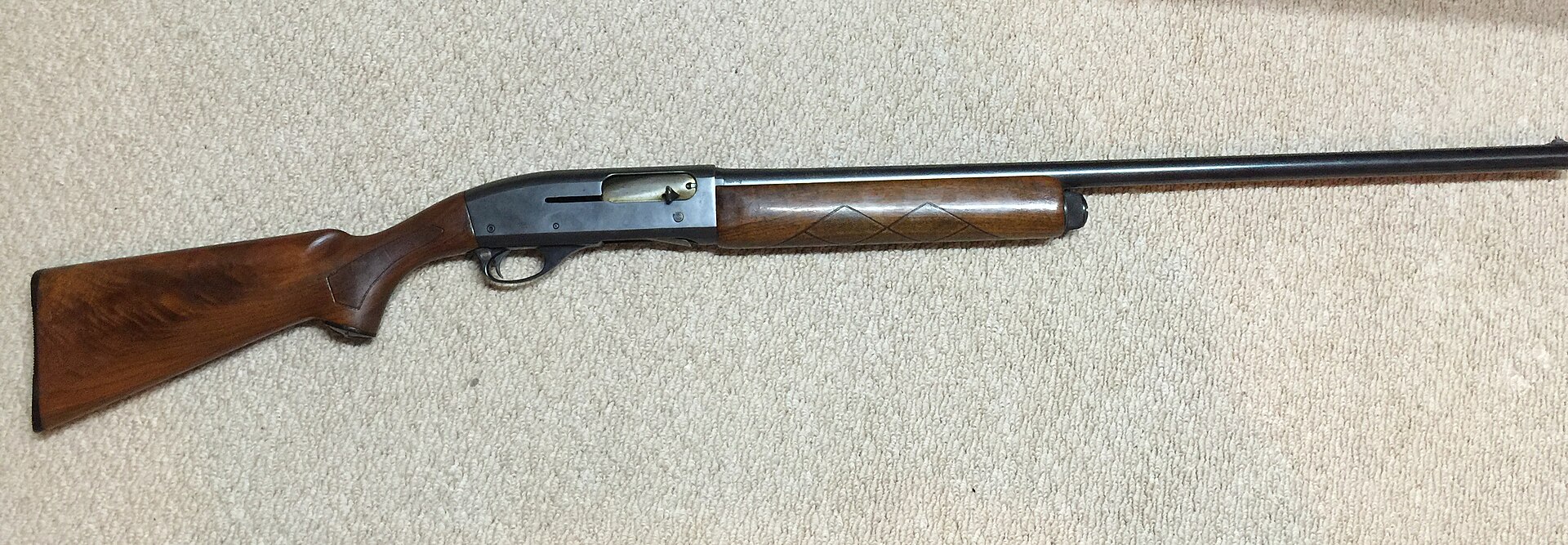 Figure 3 — A 1953 Remington 11-48 autoloader in 12 gauge. The 870's fire-control group descends from the same Crittendon patents and, in the reference literature's account, was first used in this gun. The tri…