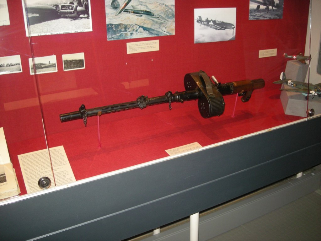 Figure 2 — 2 — Rheinmetall MG-15 (1930s German aircraft observer's machine gun), the first of the three flash-hider donor candidates. The muzzle hardware at the right (barrel jacket termination) has …