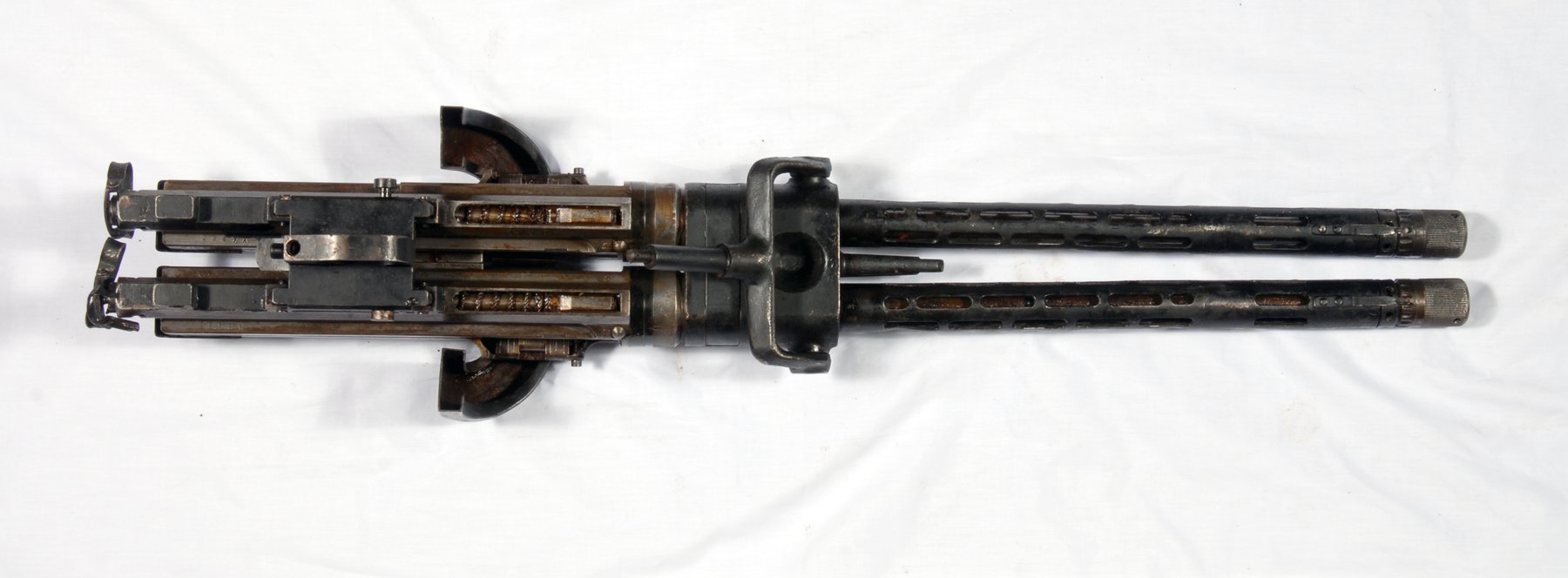 Figure 3 — 3 — Mauser MG-81 aircraft machine gun in twin-mount configuration (1939-1945, the MG-15's faster-firing successor). The MG-81 was a dual-barrel aircraft observer's weapon; visually the muz…