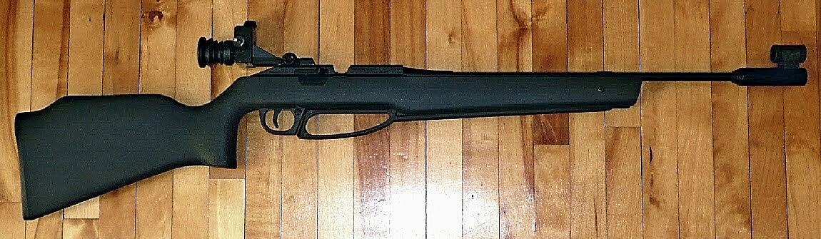 Figure 3 — A Daisy Avanti 753S Elite — the 853's single-stroke pneumatic sibling, shown here in place of an 853, which could not be sourced. Note the diopter aperture rear sight and the hooded globe front: a …