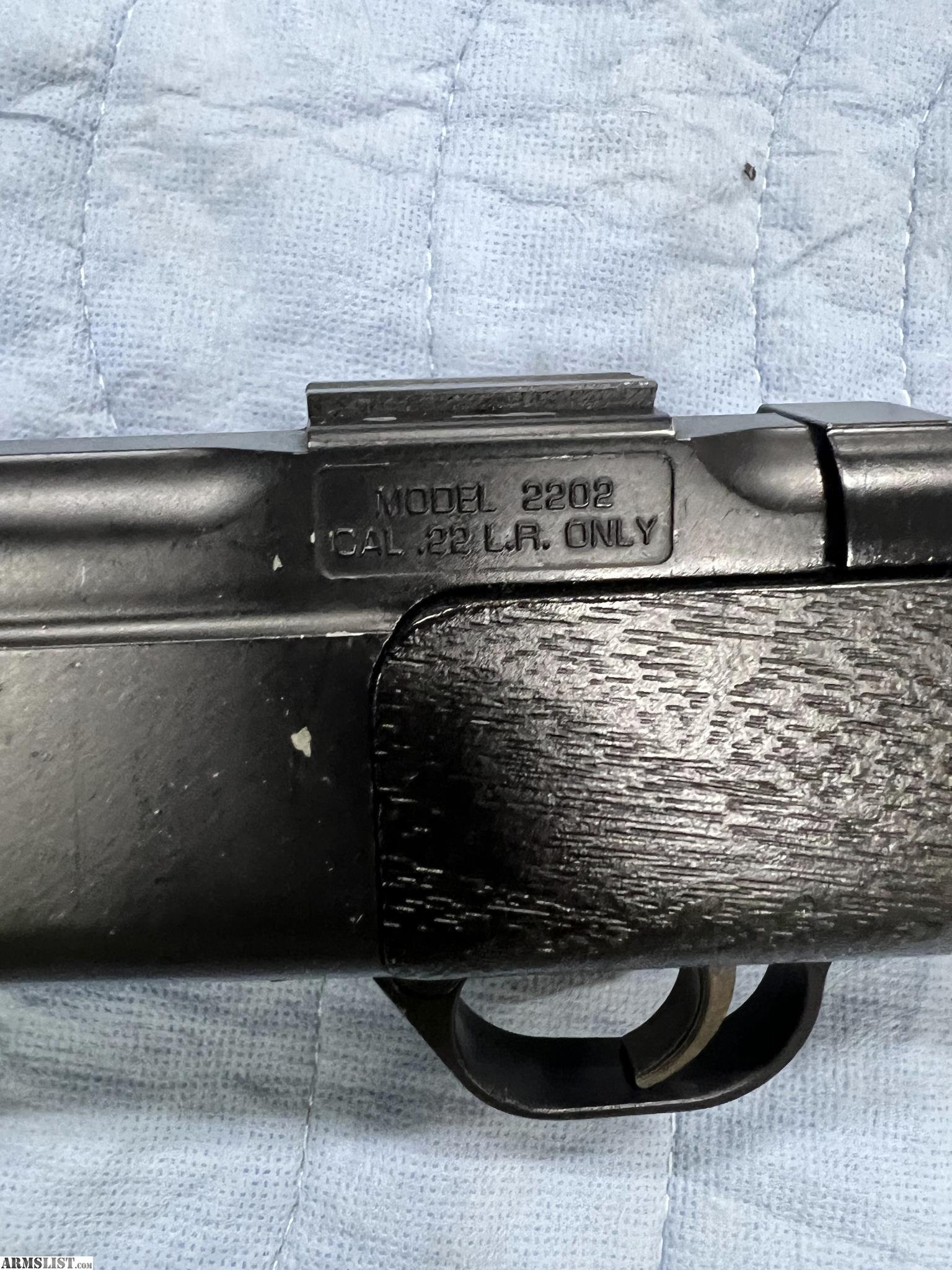 Figure 5 — The receiver of a Daisy Legacy, rolled "MODEL 2202" over "CAL .22 L.R. ONLY". There is no ambiguity to interpret here: this is a rimfire firearm, chambered for the .22 Long Rifle cartridge, wearing…
