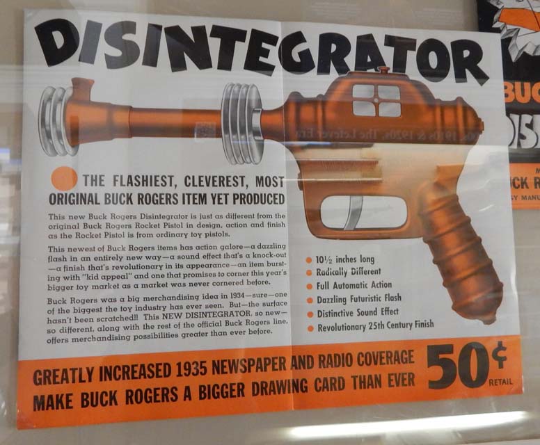 Figure 3 — Trade sheet for the Buck Rogers Disintegrator at 50 cents retail, a pressed-steel toy with cooling fins, a pop-out spark window and a sound effect. The copy takes care to distinguish it from the ea…