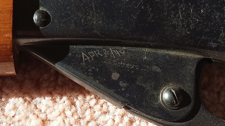 Figure 6 — The frame of Fred Harman's own gun, scratched by hand: "APR2/40". This is the single most useful object in the 1938-versus-1940 argument. It is not a catalogue date or a company anniversary claim b…