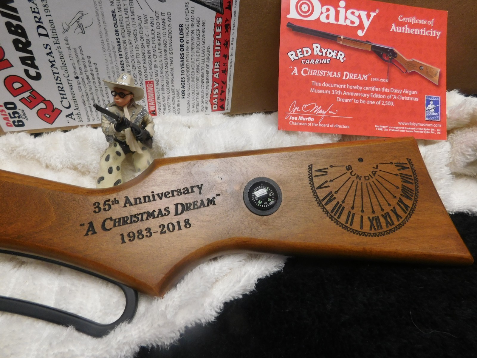 Figure 6 — A "Christmas Dream" stock engraved "35th Anniversary" and "1983-2018", with the compass inset above the sundial and a Certificate of Authenticity in frame. Read the dates carefully: this is the 201…