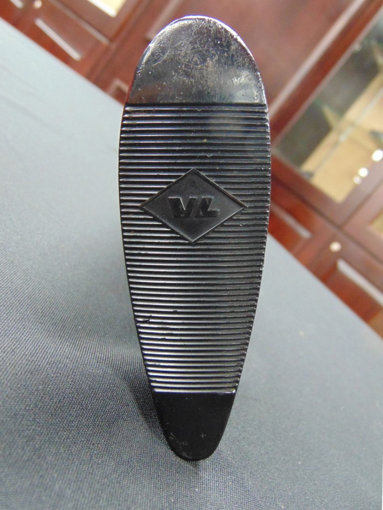 Figure 4 — The butt of a Standard V/L, with the diamond V/L monogram moulded into the plastic buttplate - one Belgian engineer's initials where a maker's name or a model number would normally go. This is the …