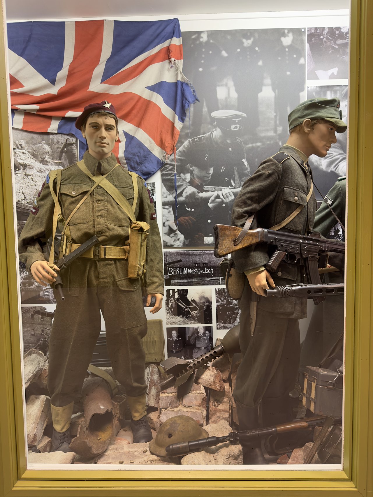 Figure 3.5 — A British paratrooper battle-dress display at the Arquebus Krigshistorisk Museum, Norway, showing the Mk V STEN as the airborne soldier's standard weapon. The Mk V furniture is fully v…