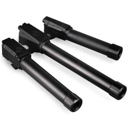 Figure 3 — Threaded pistol barrels fitted to slides. On every one of these the barrel tilts to unlock, which is what makes a booster non-optional. Source: web, reference use.